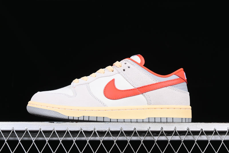 Nike Dunk Low “Athletic Department / Picante Red”