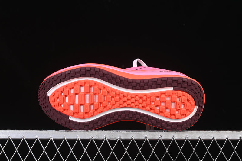 Nike Vomero Plus “Hyper Pink / Bright Crimson”