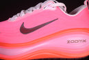 Nike Vomero Plus “Hyper Pink / Bright Crimson”