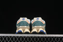 New Balance 9060 – New Spruce Peach Blossom Team Royal
