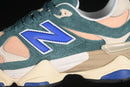 New Balance 9060 – New Spruce Peach Blossom Team Royal