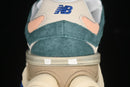 New Balance 9060 – New Spruce Peach Blossom Team Royal