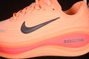 Nike Vomero Plus “Orange Pulse”