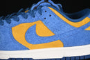 Nike Dunk Low “Panda-Monium Court Blue Yellow Ochre Suede”