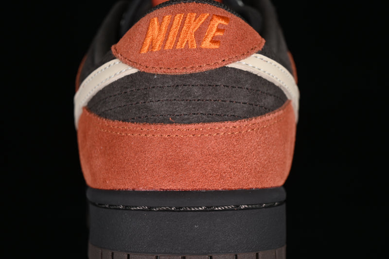 Nike Dunk Low “Red Panda”