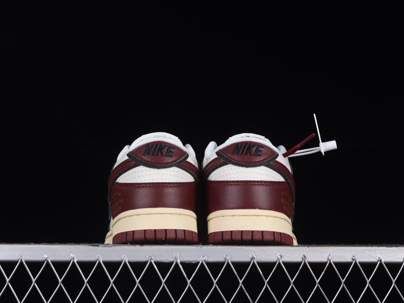 Nike Dunk Low “Sisterhood / Sail Team Red”