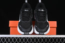 Nike Vomero Plus “Black / White”