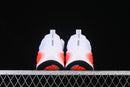 Nike Vomero Plus “White / Black / Bright Crimson”