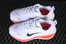 Nike Vomero Plus “White / Black / Bright Crimson”