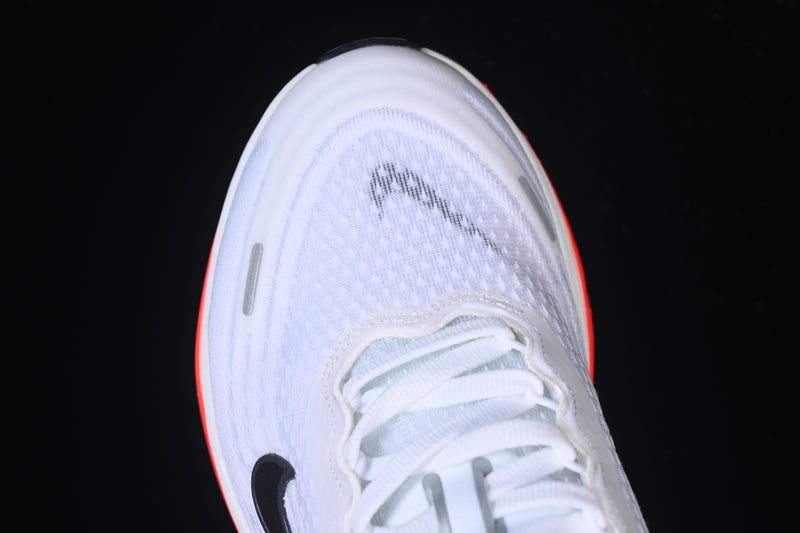 Nike Vomero Plus “White / Black / Bright Crimson”