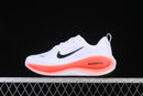 Nike Vomero Plus “White / Black / Bright Crimson”