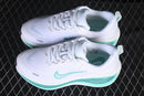 Nike Vomero Plus “White / Bleached Turquoise”