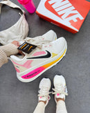 Tênis Nike Run Vomero 18 – Branco & Rosa/Amarelo