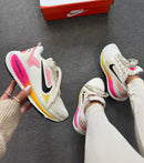 Tênis Nike Run Vomero 18 – Branco & Rosa/Amarelo